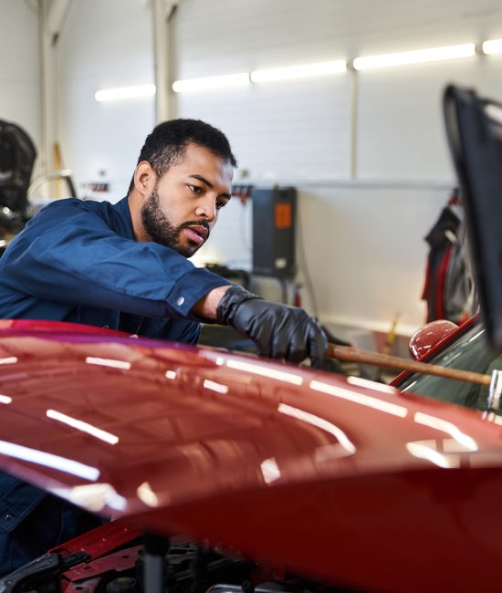 young-mechanic-skillfully-repairing-a-car-in-a-mod-2025-01-06-19-56-40-utc-min young-mechanic-skillfully-repairing-a-car-in-a-mod-2025-01-06-19-56-40-utc-min